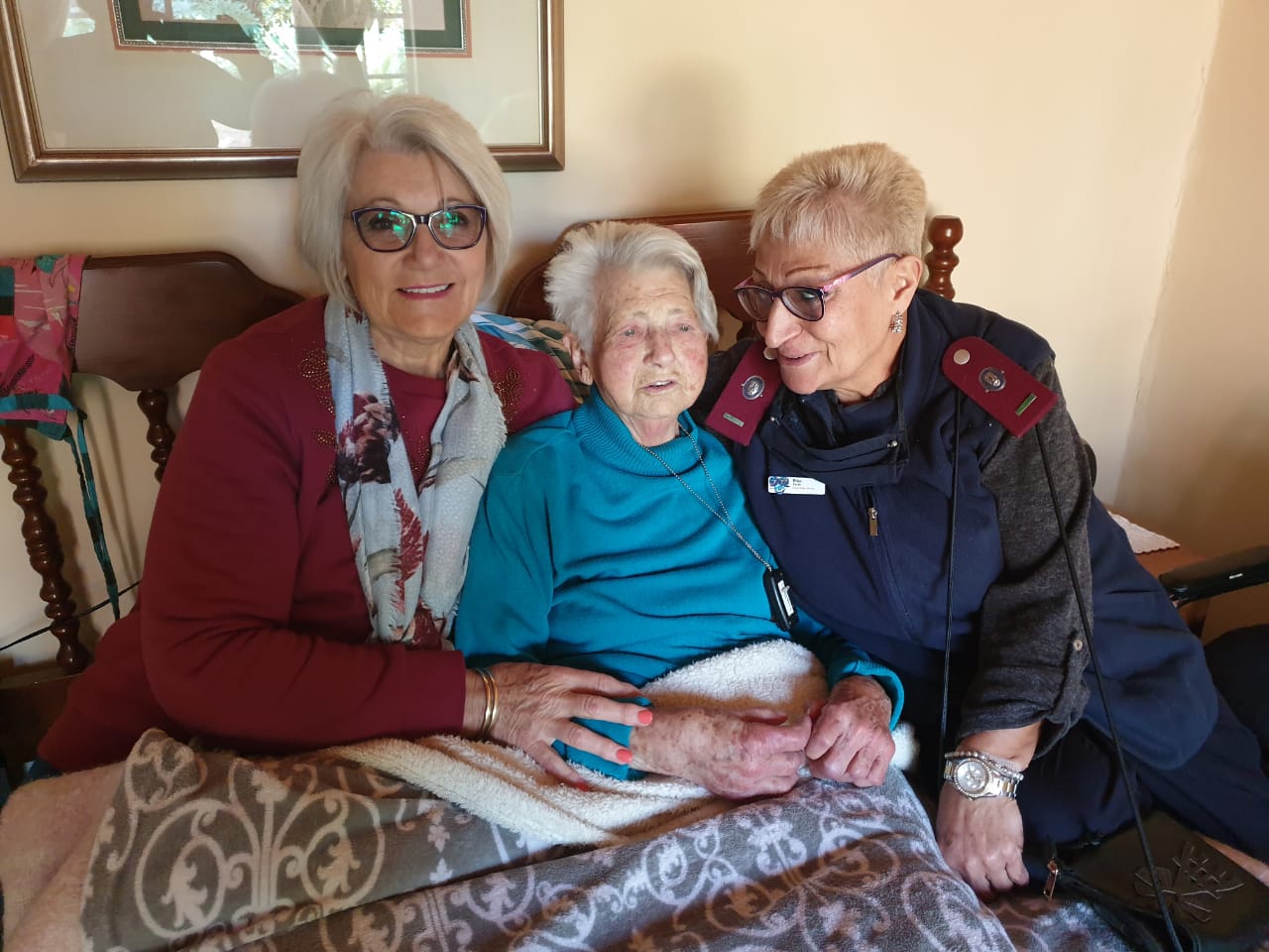 Suster en familie saam inwoner